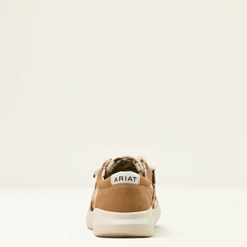 Brown sneaker with 'Ariat' branding on a white background