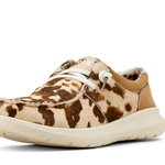 Brown and beige sneaker with a cow print pattern on a white background