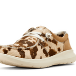 Brown and beige sneaker with a cow print pattern on a white background